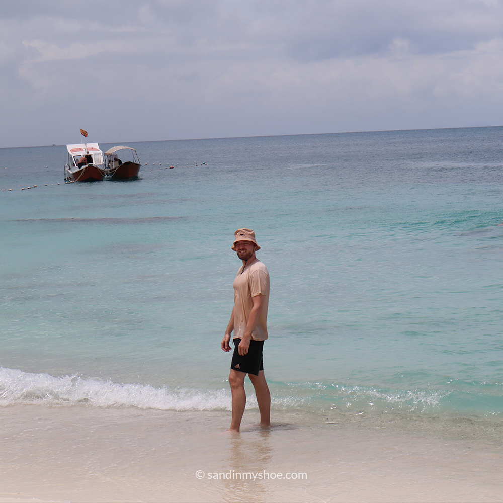 Relaxing on Pulau Kecil beach, perfect for the laid-back days of a Malaysia 1-month itinerary