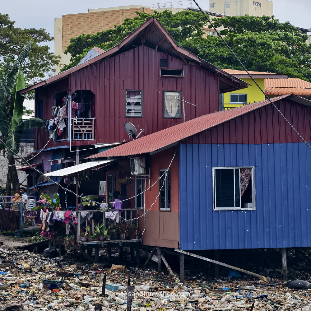 Trash floating in the water near Semporna, highlighting the environmental issues affecting Malaysia’s coastal regions