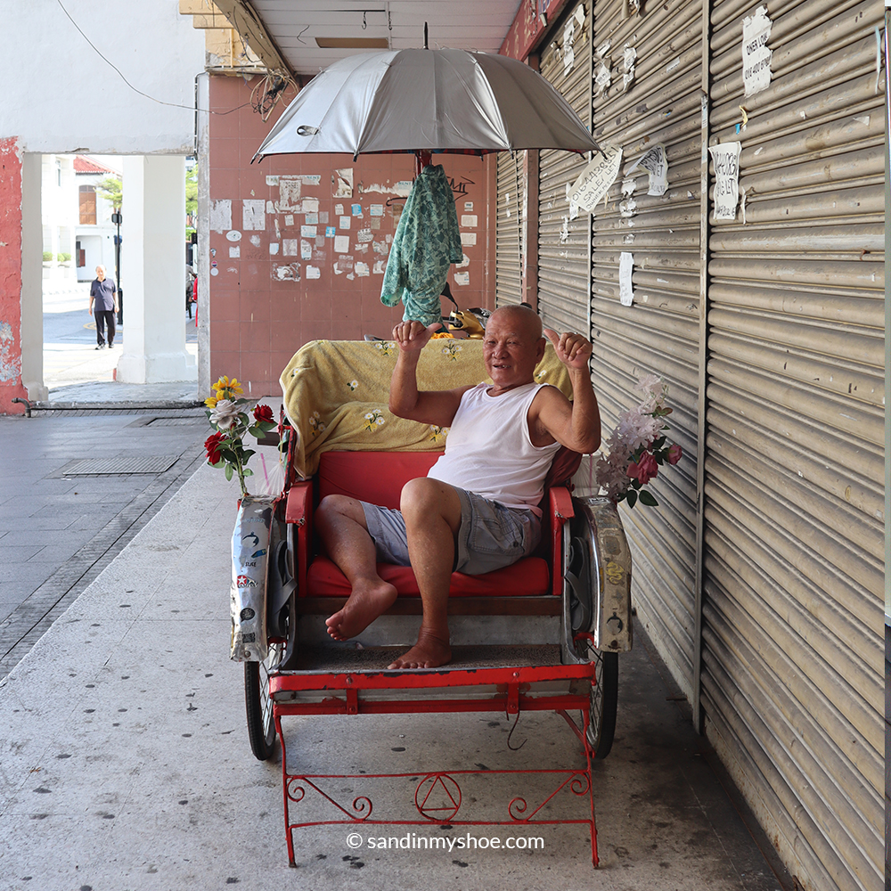 Traditional bicycle taxi ride in George Town Penang – unique local experience