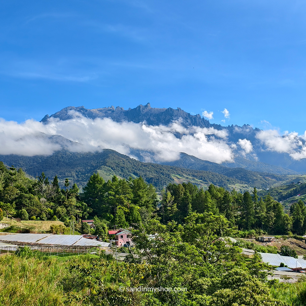 Mount Kinabalu towering over the landscape near Kundasang, Sabah