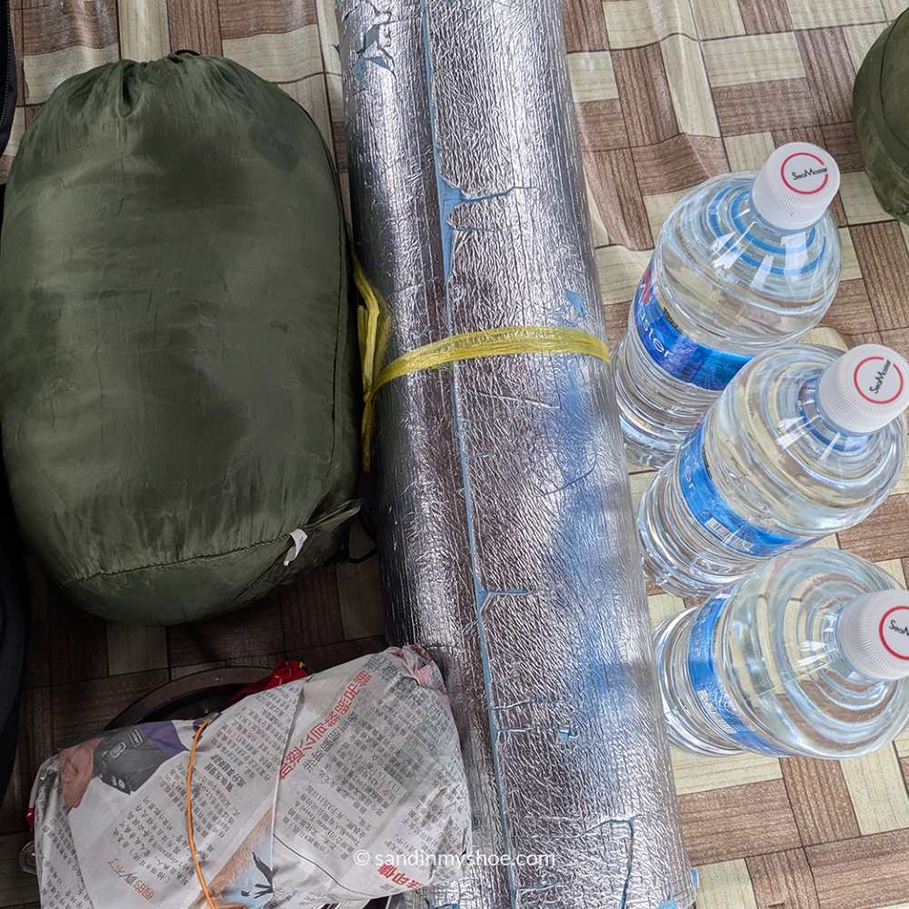 Essential packing for sleepover in a cave during taman negara jungle trek.