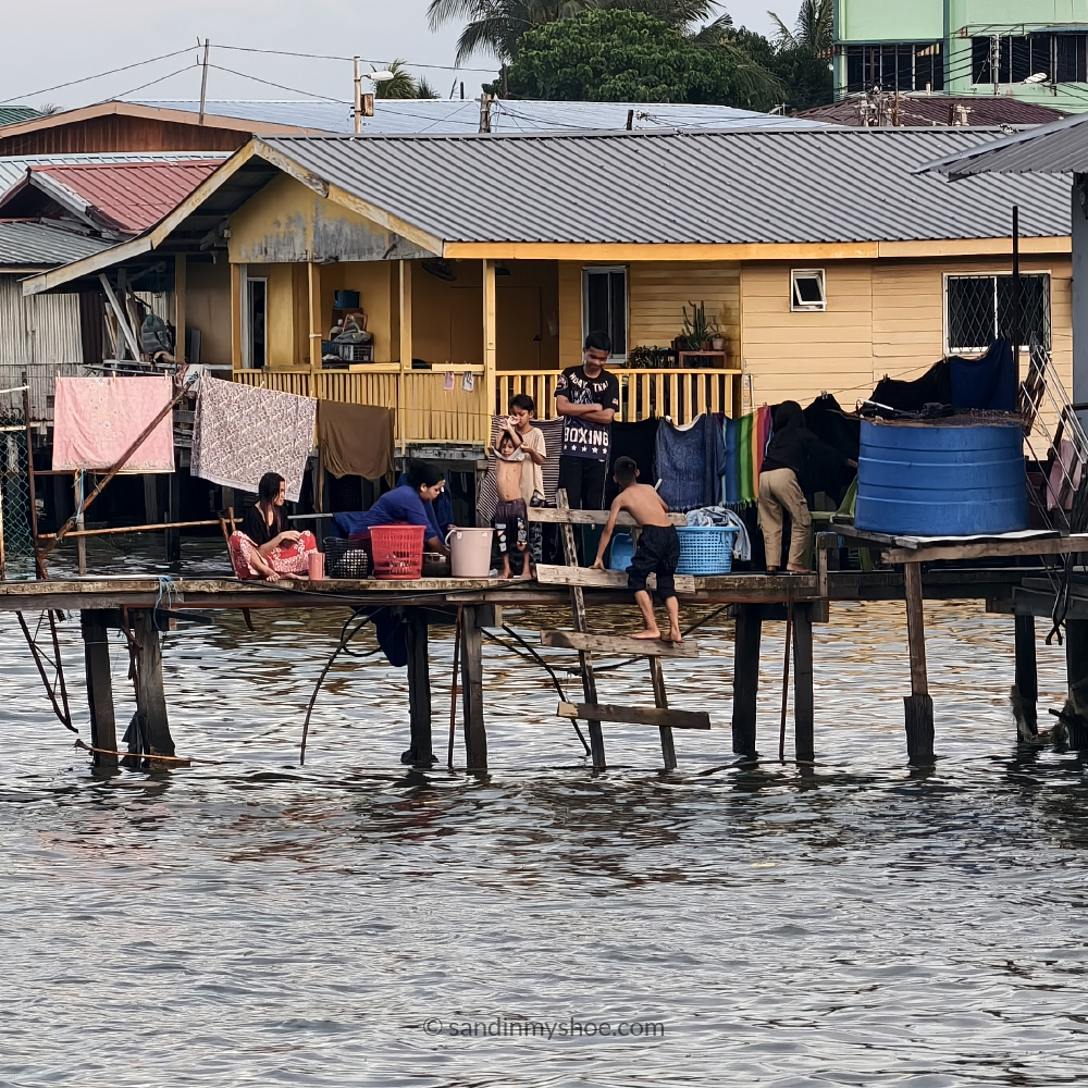 Colorful houses on stilts at Sim Sim Water Village near Sandakan, Borneo