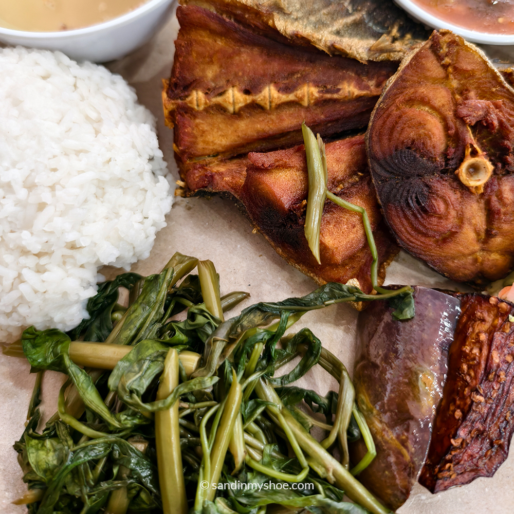 Local Sabah dishes served at a food stall in Kundasang