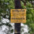 Warning sign for electric fence in a national park in Sri Lanka