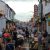 Jonker Street in Malacca bustling with people, shops, and street food stalls
