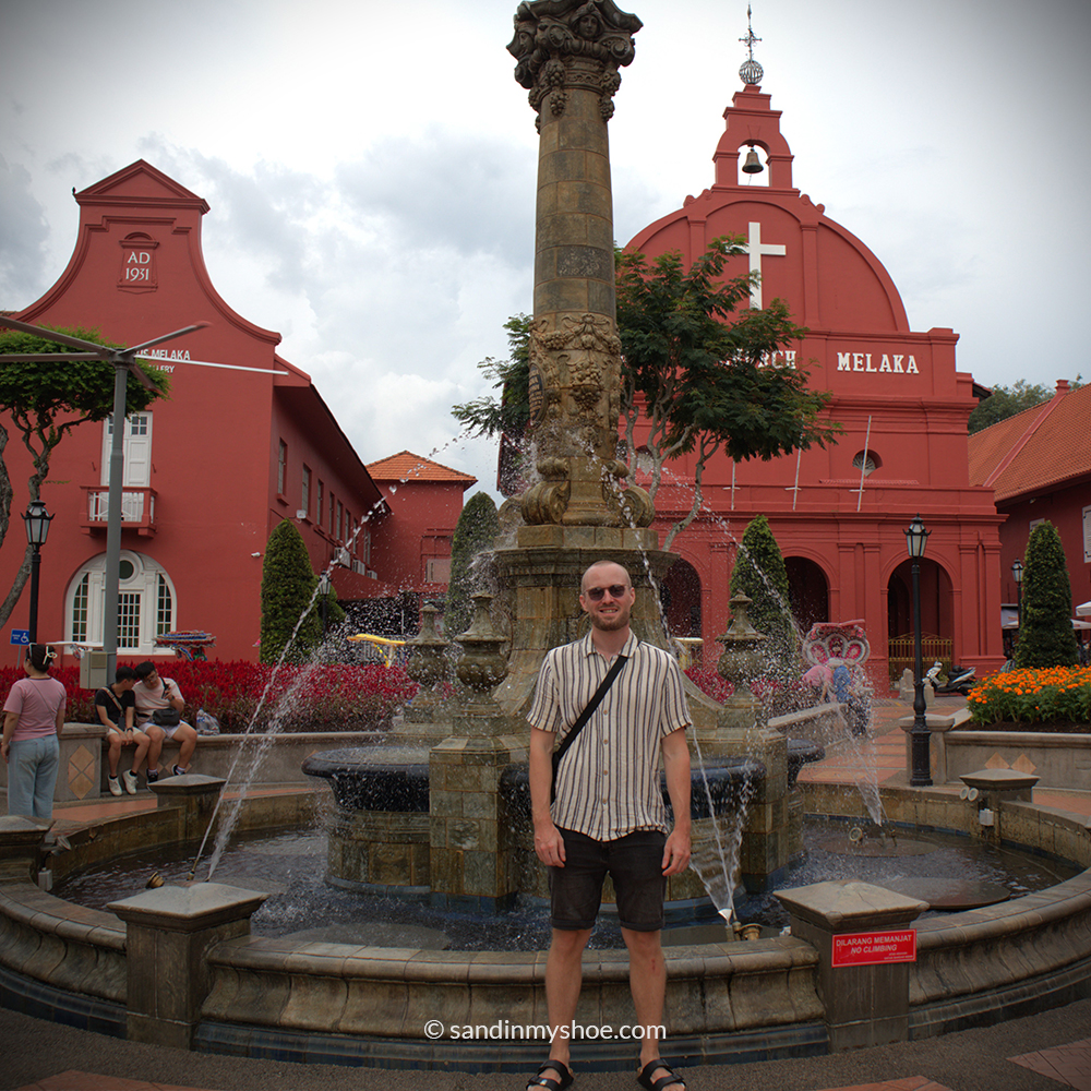 Petteri standing in Dutch Square, a key stop on the Malacca itinerary