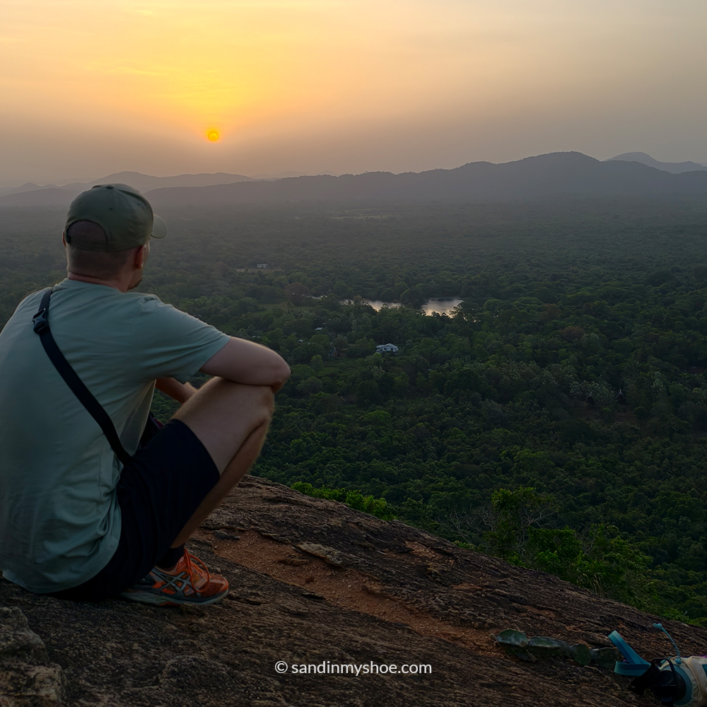 Golden sunrise view from Pidurangala during early Sigiriya hikes.