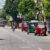 Five colorful tuk tuks parked in Negombo, the perfect launch point for any Sri Lanka tuk tuk route or itinerary.