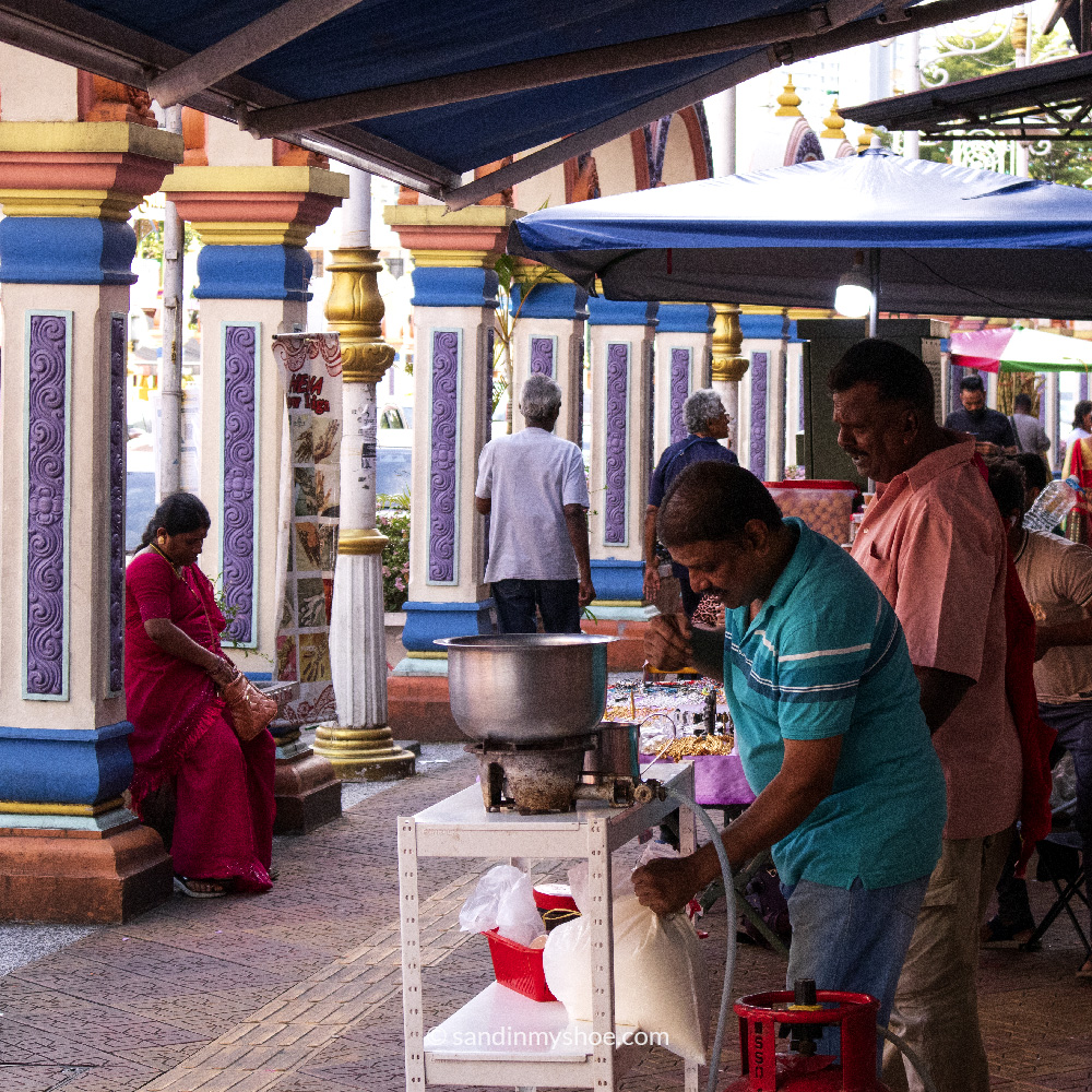 Colorful storefronts and street life in Brickfields, Kuala Lumpur’s Little India — a vibrant neighborhood known for its South Asian heritage.