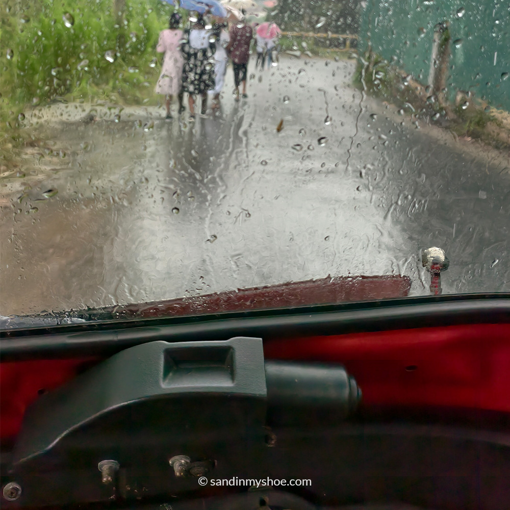Petteri in a tuk-tuk during rain