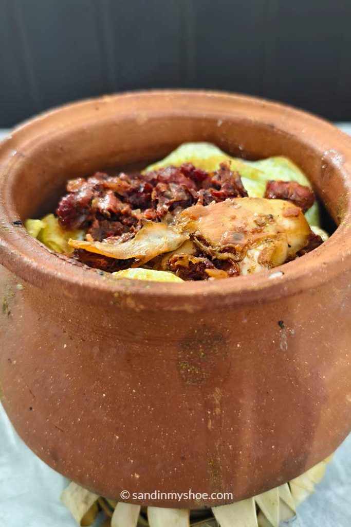 Rice and curry served in a warm pot.