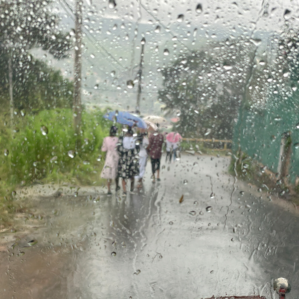View from inside a tuk‑tuk on a rainy day, with water dripping down the windscreen, illustrating the mixed weather travellers consider when asking “Is November a Good Month to Visit Sri Lanka.