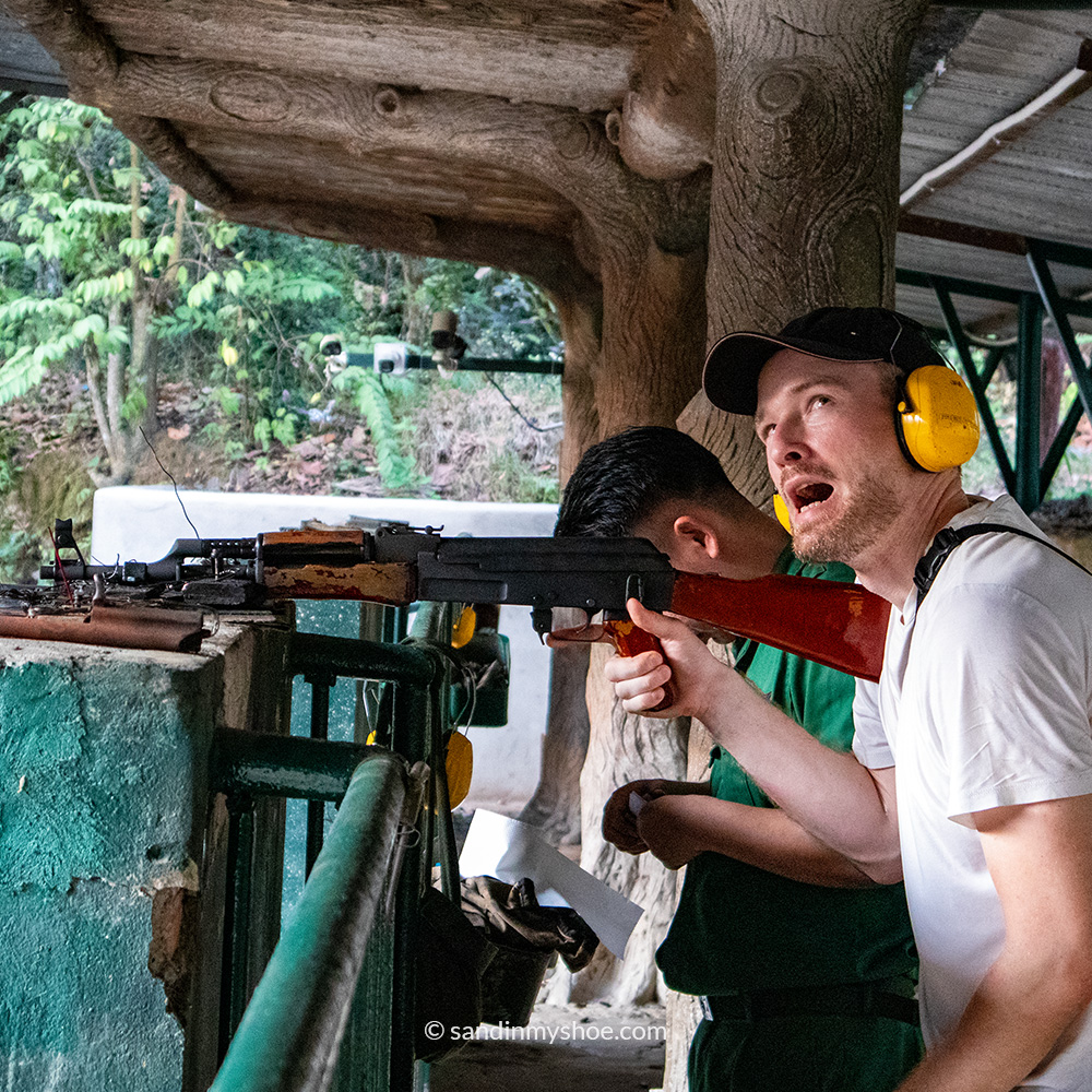 Petteri shooting an AK at the end of the tour