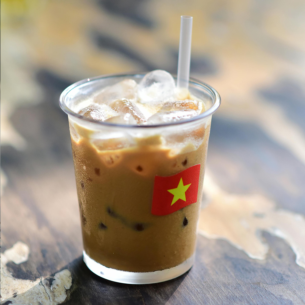 Iced coffee on a hot day in Vietnam, a simple pleasure that belongs on any list of what to do in Vietnam.