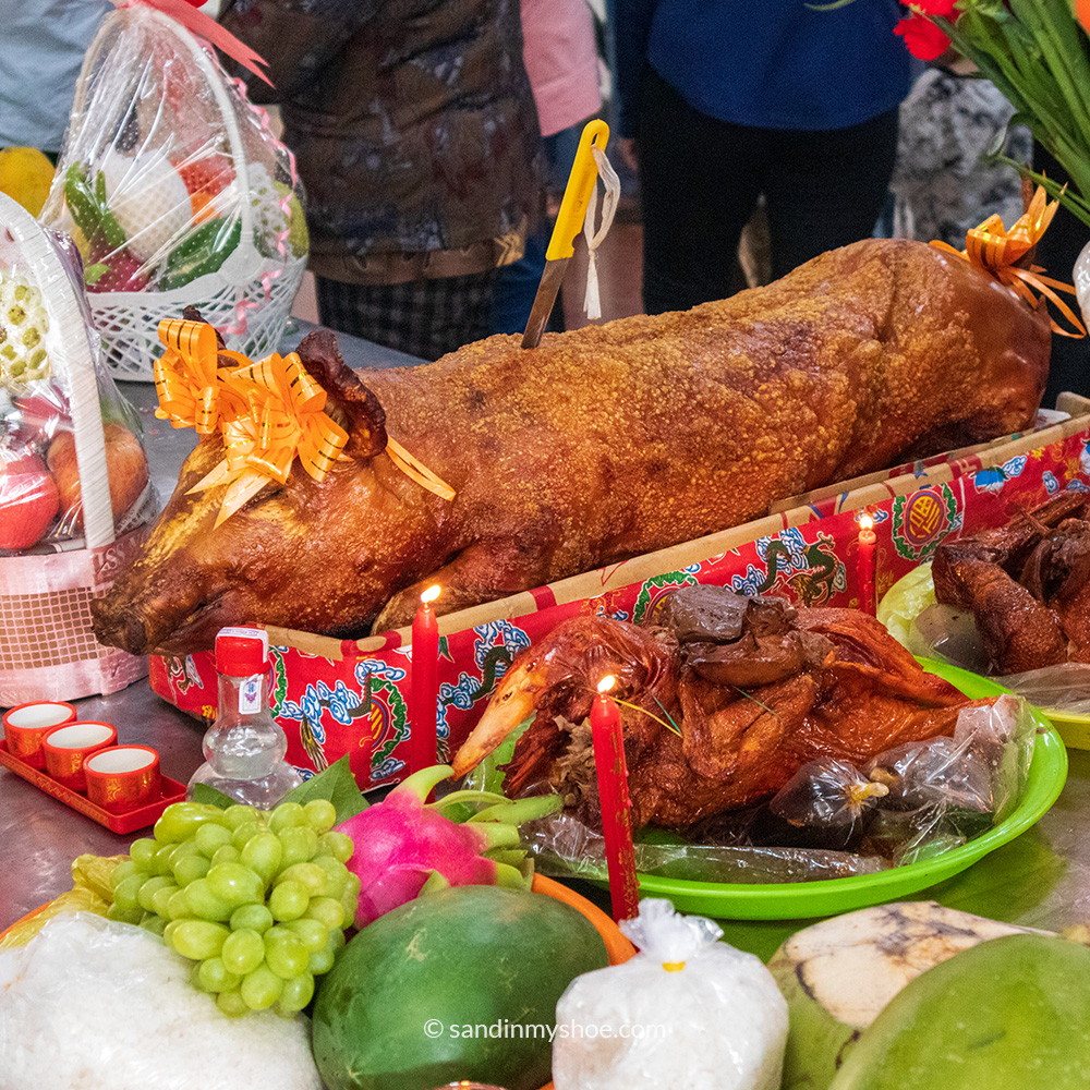 Buddhist offerings in all forms: meat, fruit, and small everyday gifts.