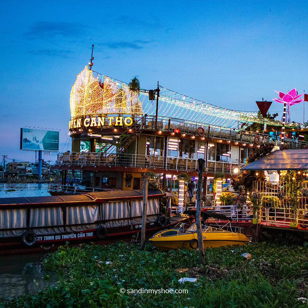 Floating restaurant along the riverbank in Can Tho