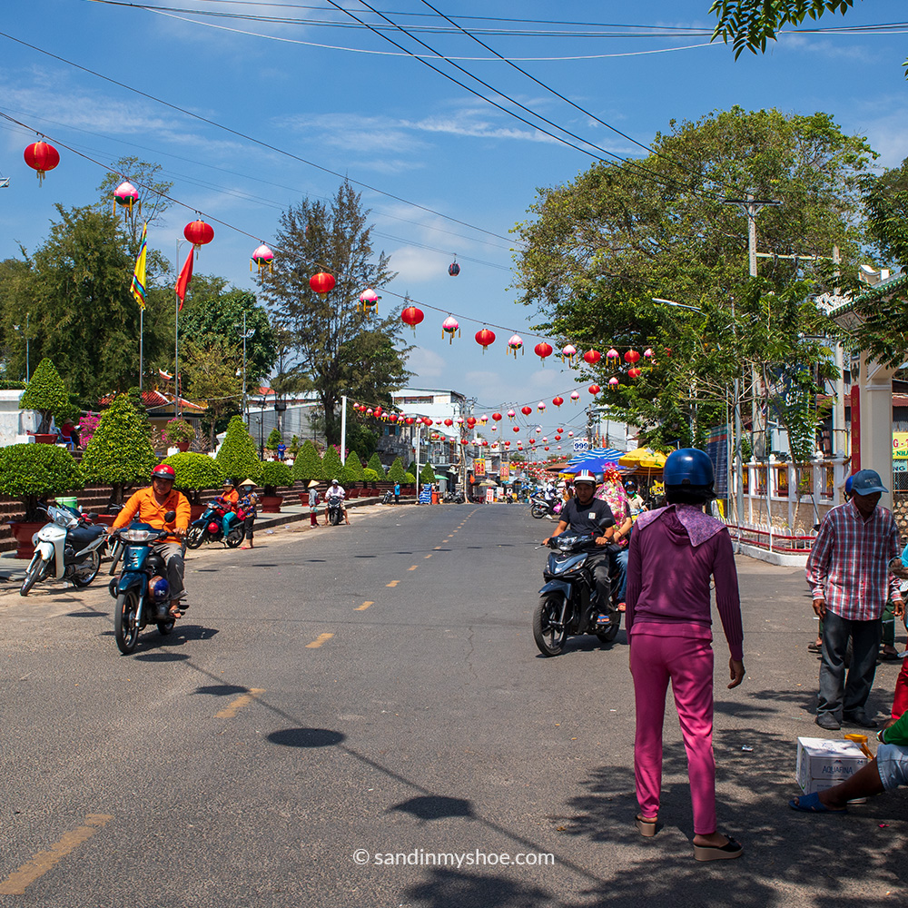 road with Buddish prayer balls in Chau Doc Vietnam  