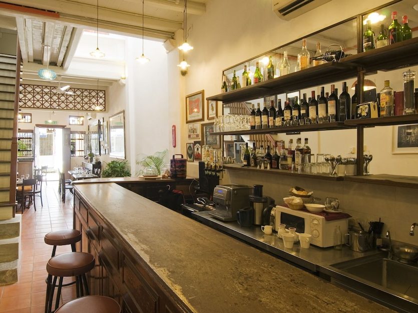 Downstairs café and bar area at 23 Love Lane Hotel with a relaxed, homely atmosphere.