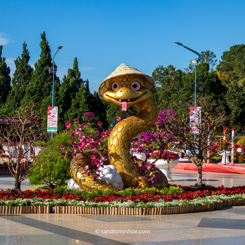 Snake statue at the entrance of Dalat’s Flower Garden, displayed for the Year of the Snake during the Lunar New Year period.