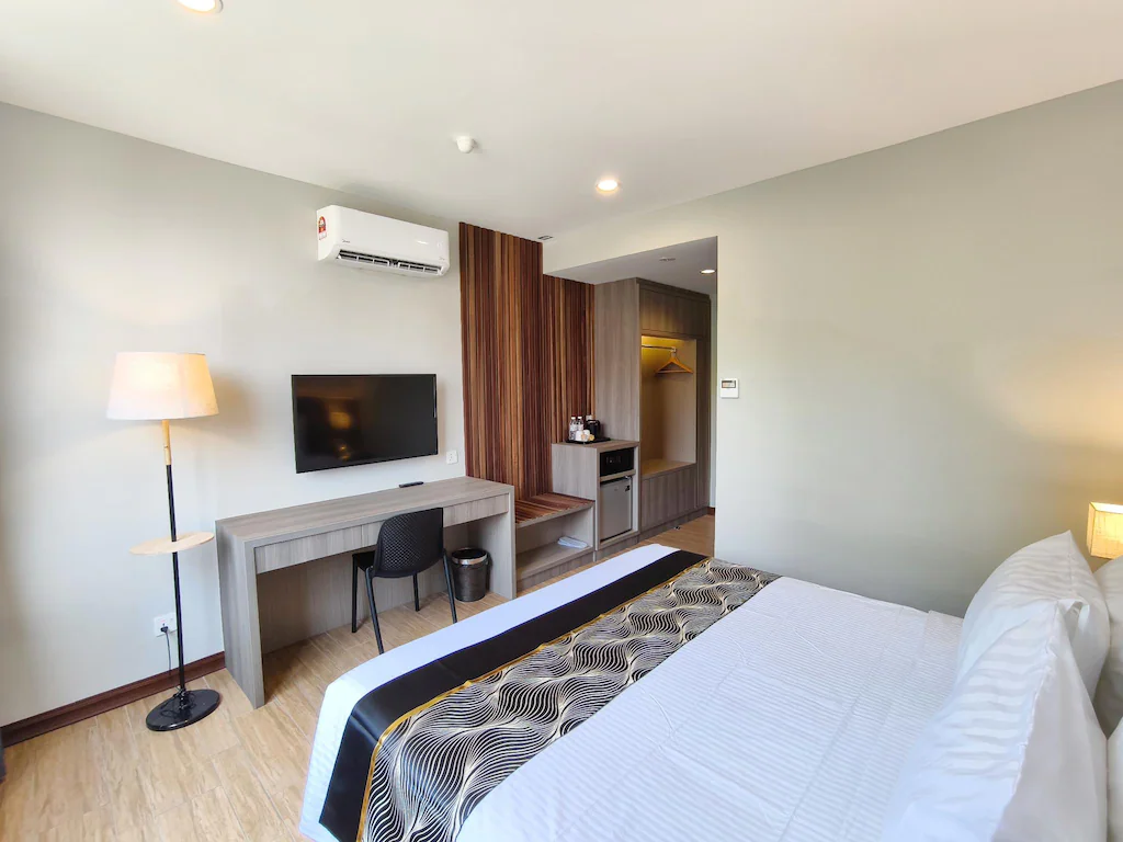 Double room at Veno Hotel with a simple but decent workstation suitable for digital nomads.