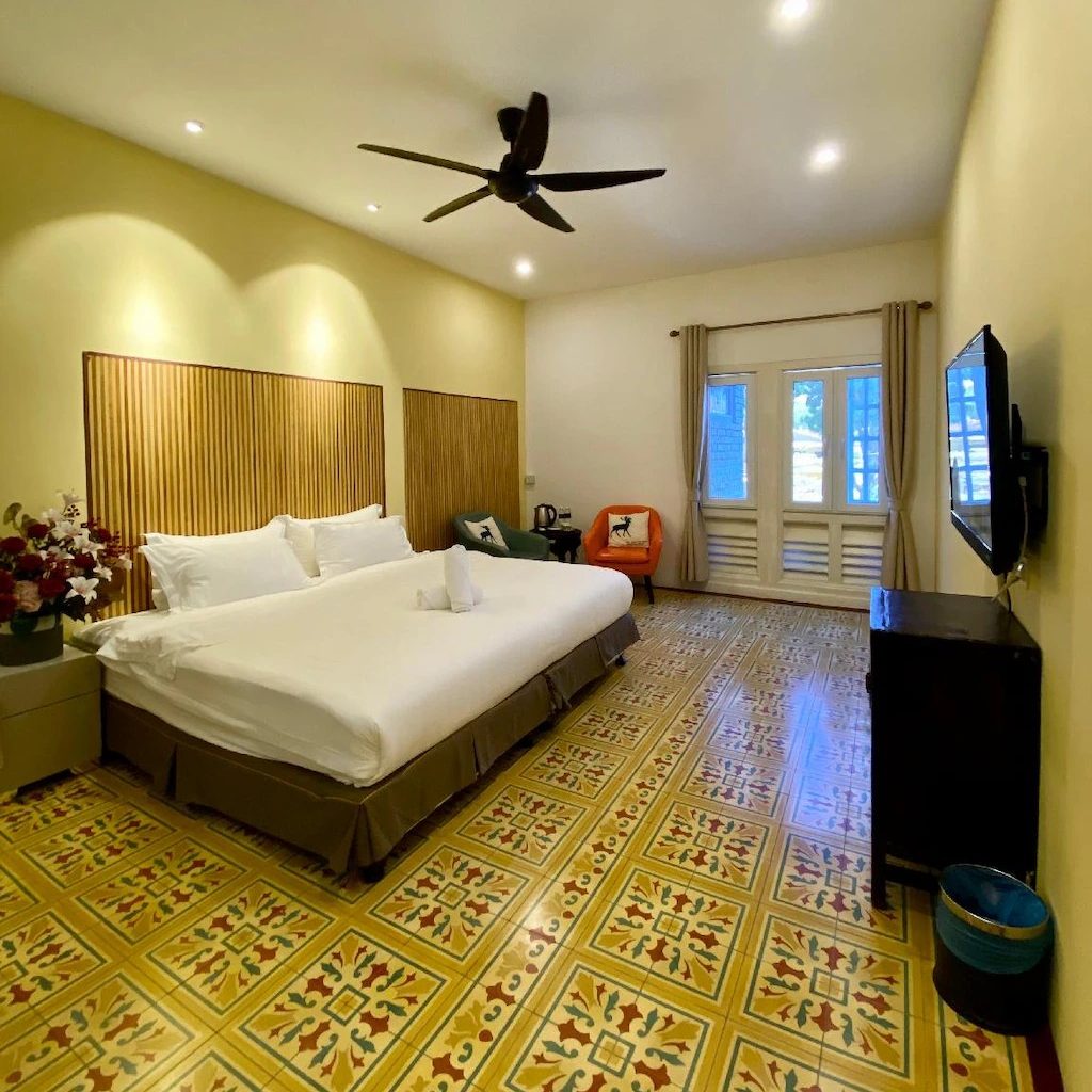 Simple, clean room at Bayu Bayu Hotel by Soft Loft with basic furnishings.
