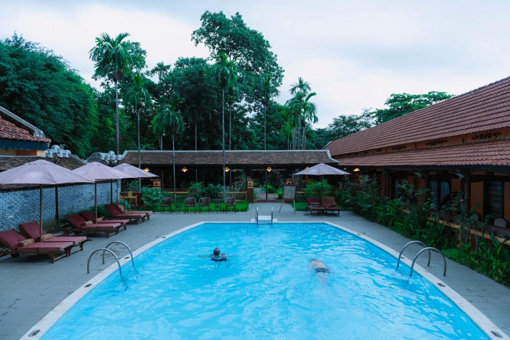 Outdoor pool at Spatel d'Annam Hotel inside the Imperial City in Huế.