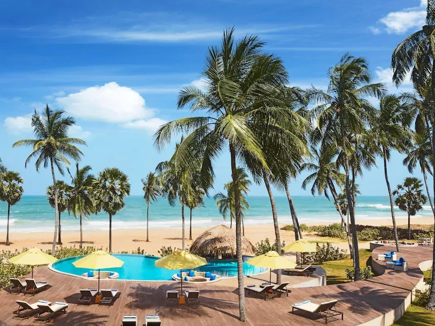Jetwing Surf & Safari Hotel area with pool next to the beach in Arugam Bay.