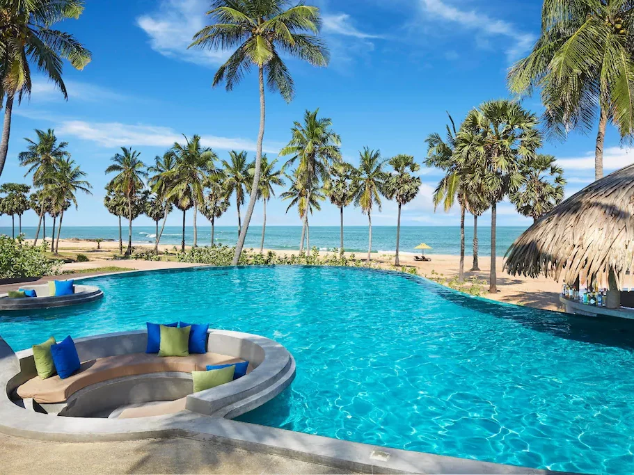 Jetwing Surf & Safari pool area with direct views of the beach and ocean.