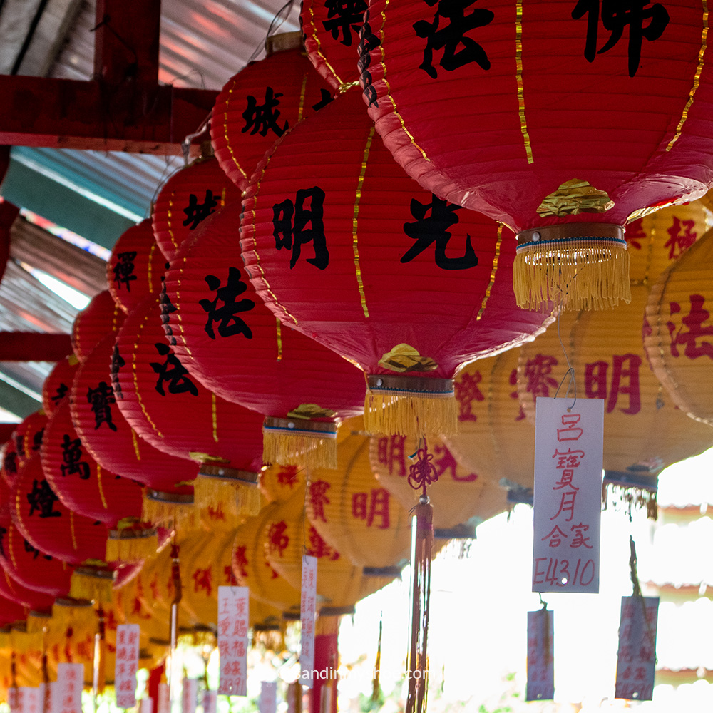Rows of colourful lanterns hanging at Kek Lok Si, each one sponsored by a donor as a symbol of generosity.