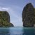 Turquoise water flowing between two steep, lush hilltops — a scenic view that captures why this area belongs on any list of where to go in the Philippines.