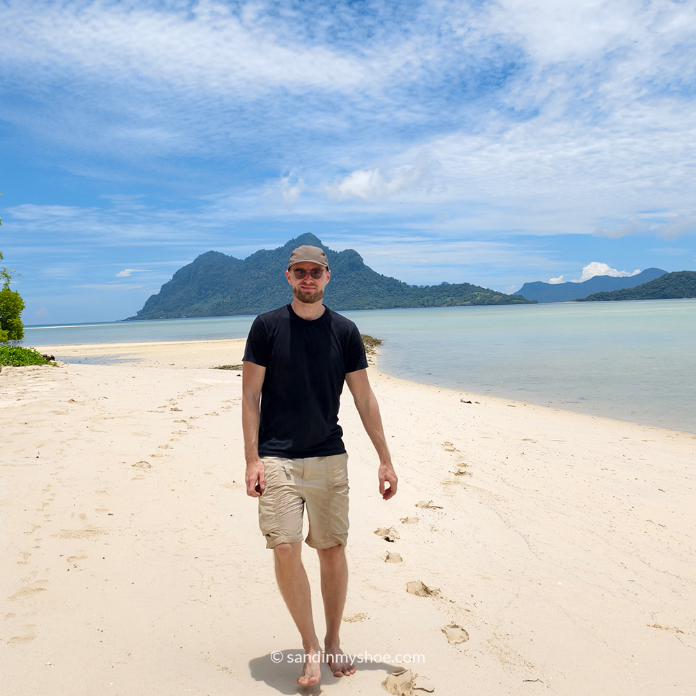 Petteri walking on the beach on an island near Semporna, Borneo, Malaysia.