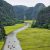 Trang An boat tour in Ninh Binh, one of the highlights of this Vietnam 3‑week itinerary, showing rowboats moving through limestone cliffs and river valleys.