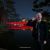 Petteri at Hoan Kiem Lake in Hanoi, Vietnam, with the illuminated red bridge behind him during an evening walk.