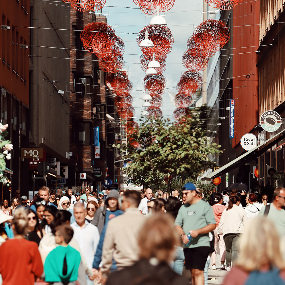 A lof of people walking in Drottninggatan in Stockholm.