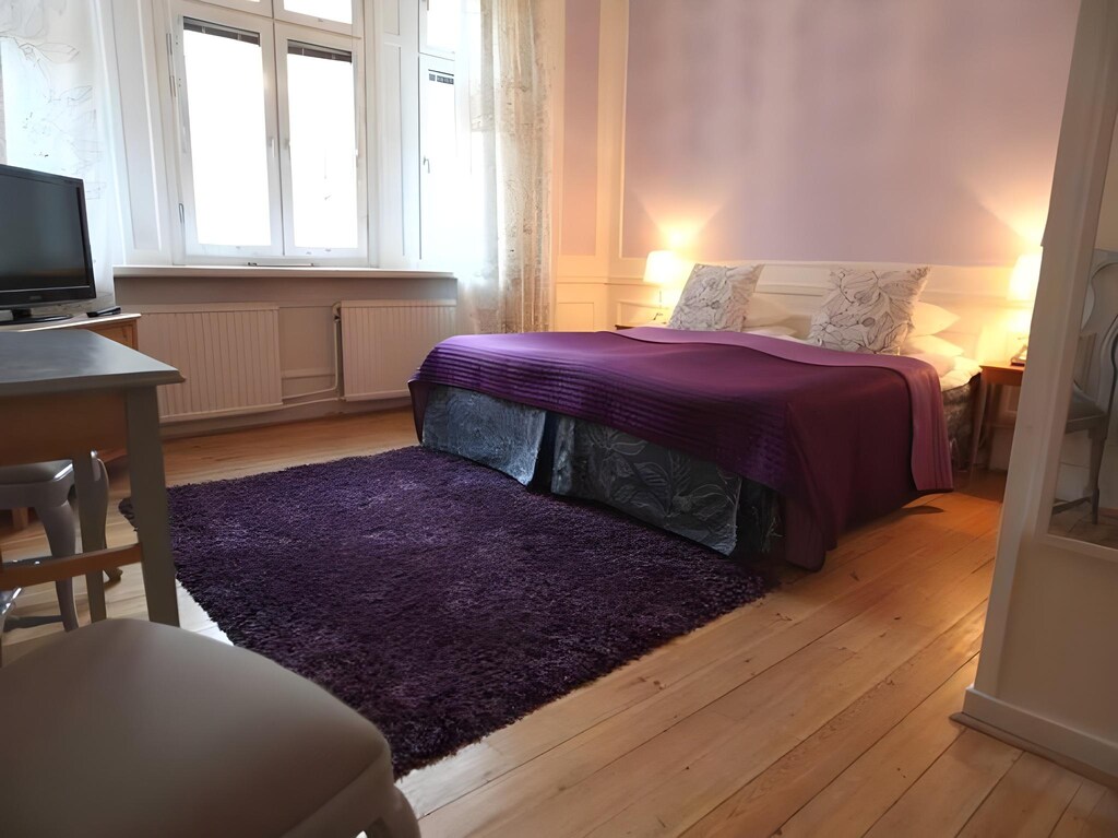 One of Hotel Hornsgatan’s standard rooms with clean, modern furnishings and a simple, comfortable layout.
