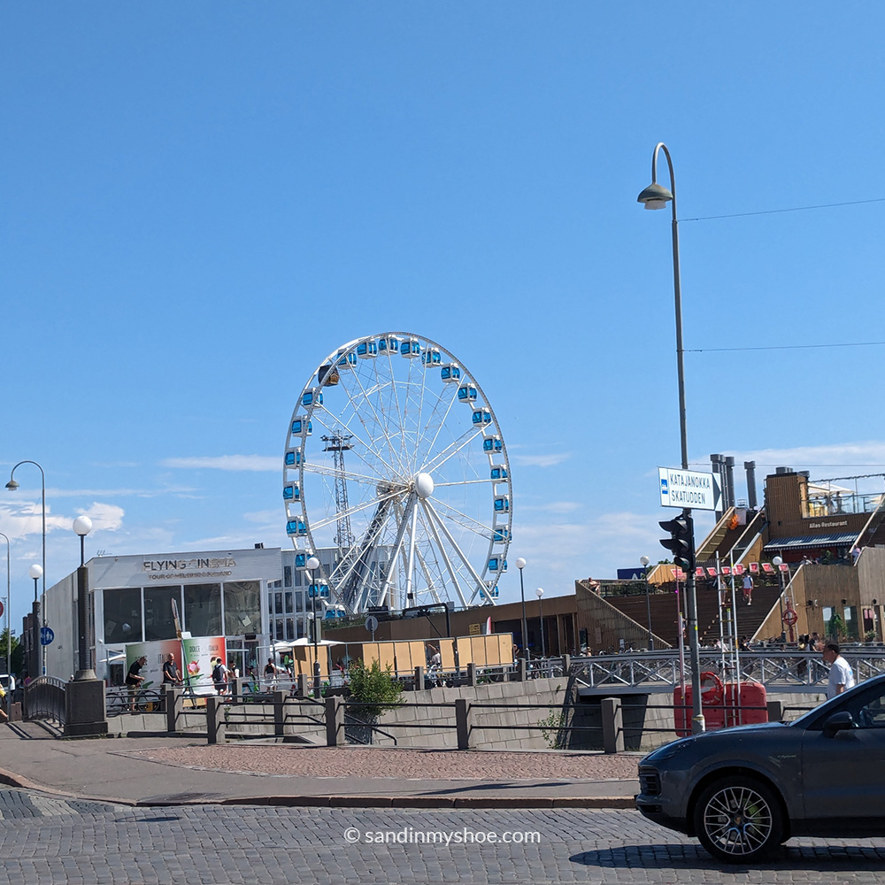 Ferris wheel in Helsinkin with one gondola that's a sauna.