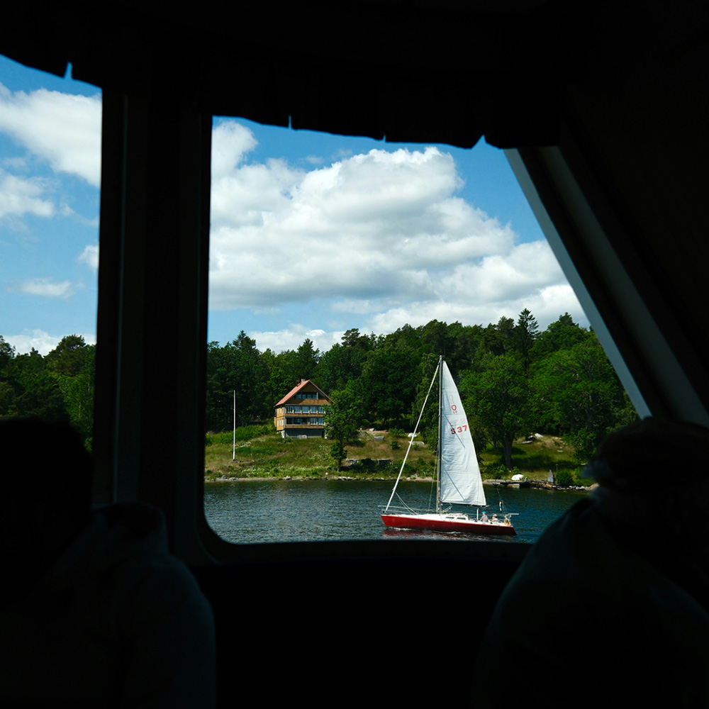 Vaxholm seen thorugh the window of the ferry.