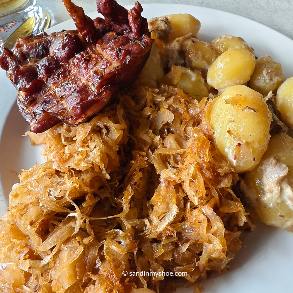 Estonian food, sweet kale, chicken, and potatoes.