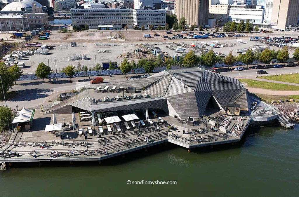 Exterior view of Löyly's award-winning modern wooden architecture on the Helsinki waterfront.