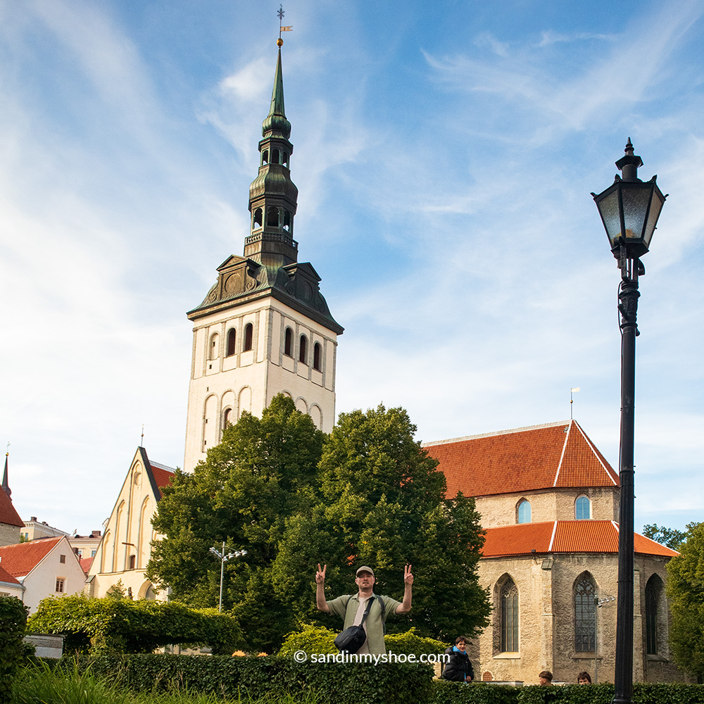 Petteri at harju street, posing with the Nikolai church.