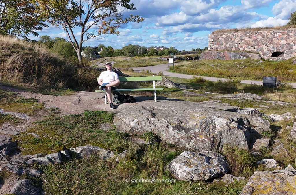 Petteri on a bench in Suomenlinna.